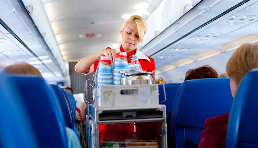 snack and drink service by flight attendant