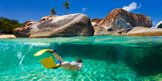 woman snorkeling at the Baths in the British Virgin Islands
