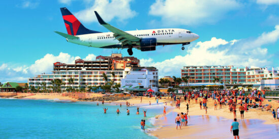 Delta Air Lines plane landing at Maho Beach in Saint Maarten in the Caribbean