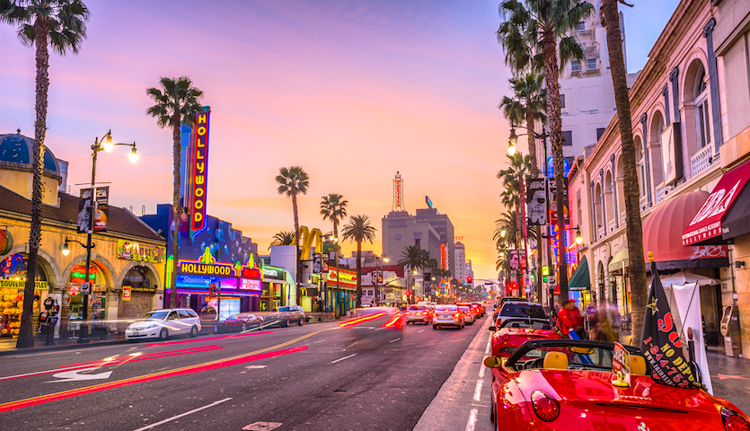 Hollywood Boulevard in Los Angeles at night with cars