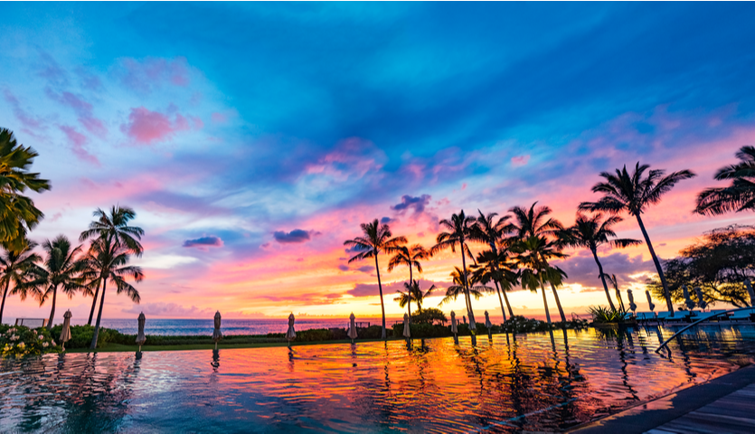 sunset in Honolulu Hawaii over infiniti pool
