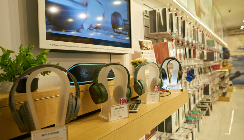 headphones and cellphone accessories on display in airport store