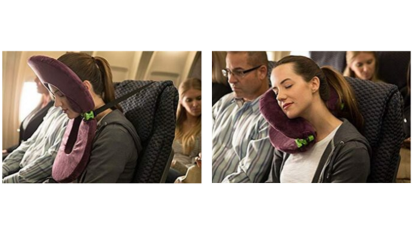 woman with FaceCradle travel pillow on airplane, forward leaning, side leaning
