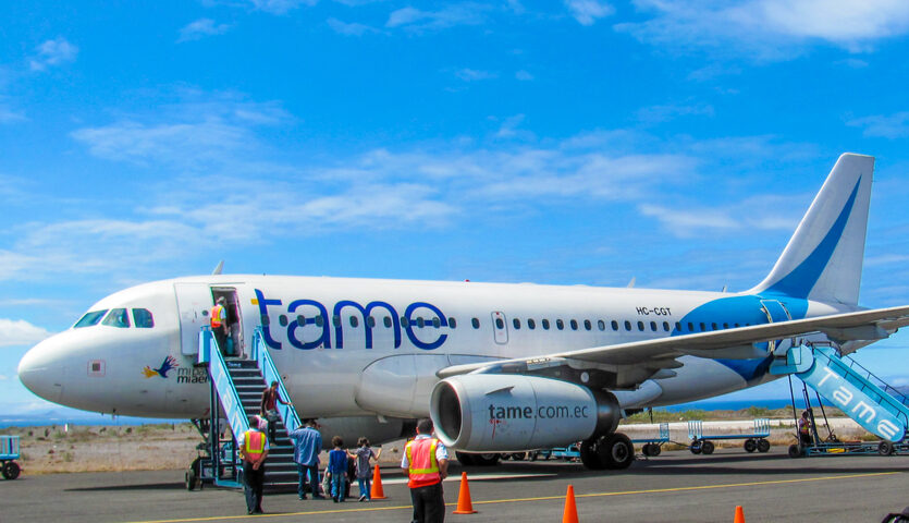 TAME Ecuador airplane parked on tarmac
