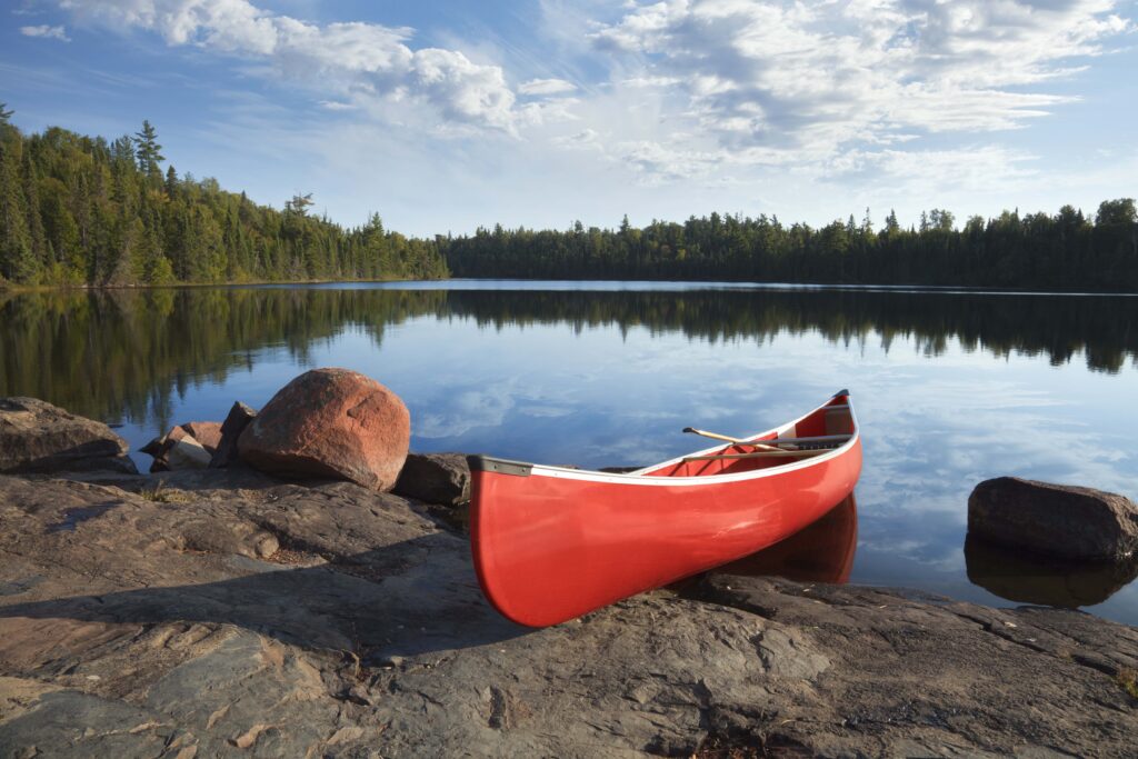 canoe on rocky shore of lake in the Boundary Waters of Minnesota